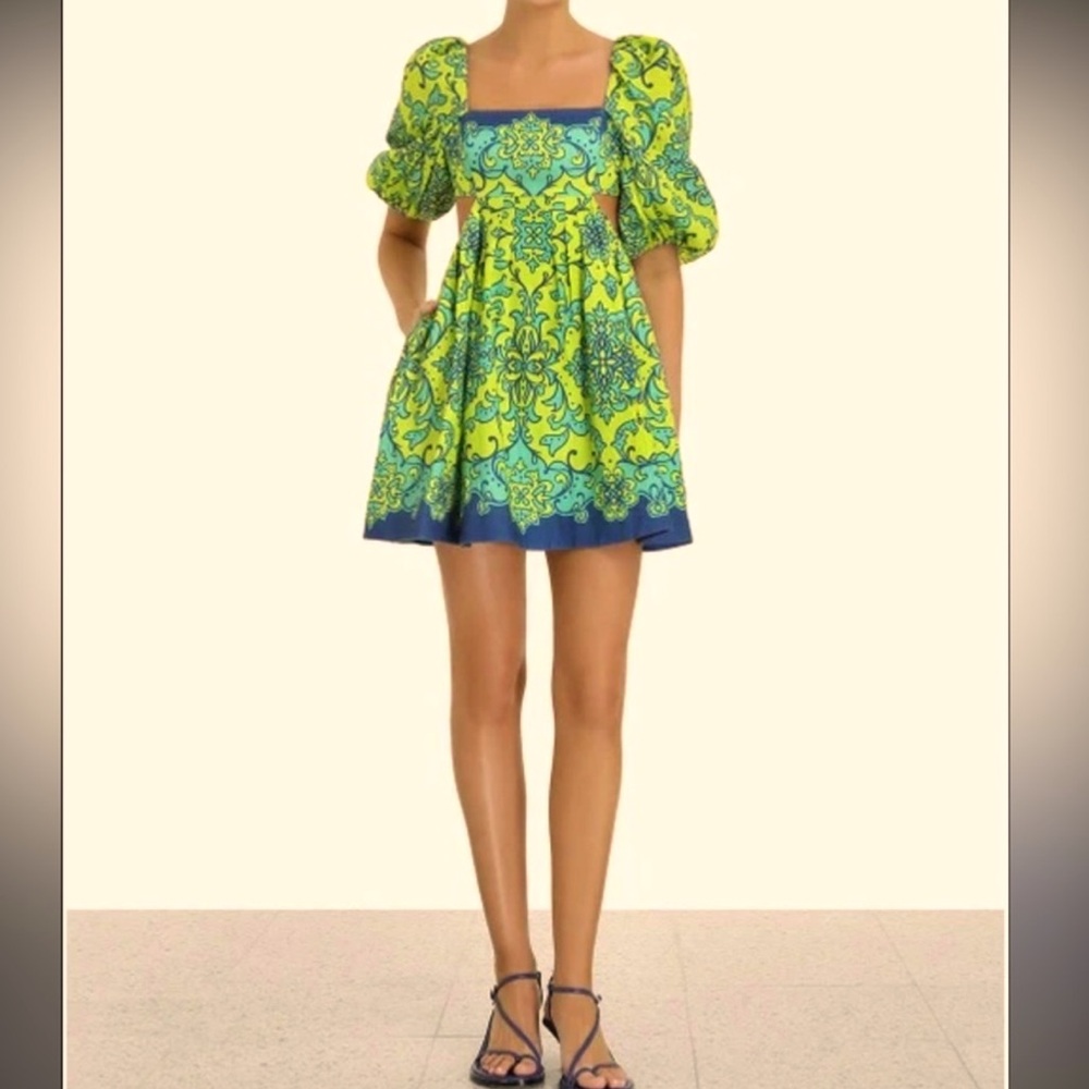 Never worn! Tags still attached. Size zimmermann 3/US10. Nina Cut out mini dress